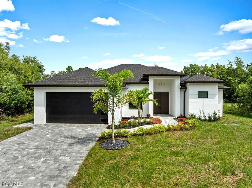 NEW CONSTRUCTION | MINUTES TO SR-82 | NO FLOOD ZONE 3BR + den - Beach Home for sale in Lehigh Acres, Florida on Beachhouse.com
