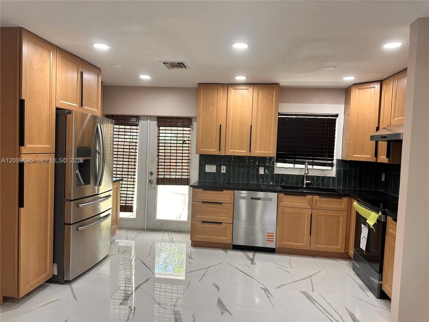 Beautifully renovated, move-in ready 3BR/2BA home featuring - Beach Home for sale in Palm Beach Gardens, Florida on Beachhouse.com