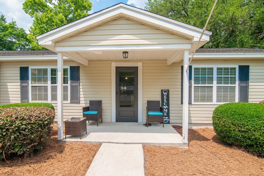 Welcome home to this charming ranch style home nestled among - Beach Home for sale in Georgetown, South Carolina on Beachhouse.com
