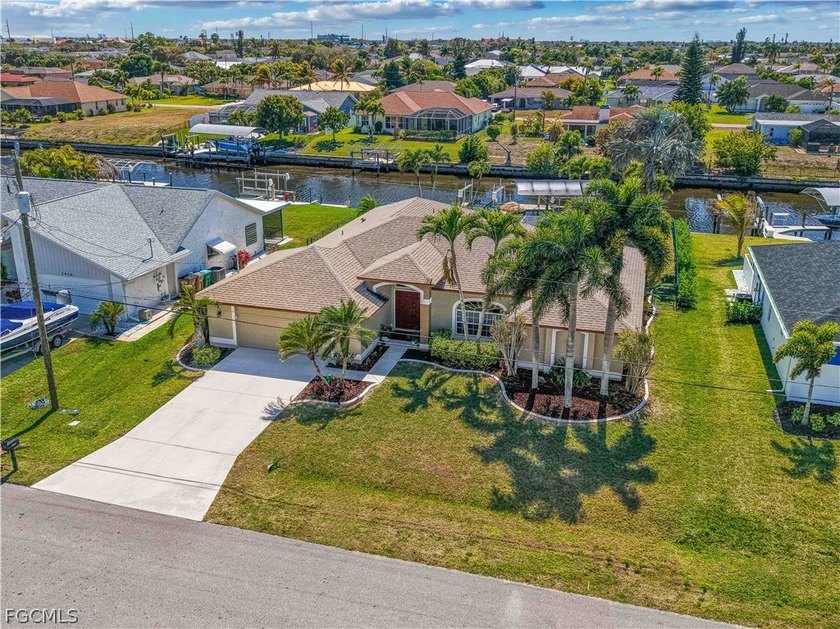 Live the ultimate Southwest Florida waterfront lifestyle in this - Beach Home for sale in Cape Coral, Florida on Beachhouse.com