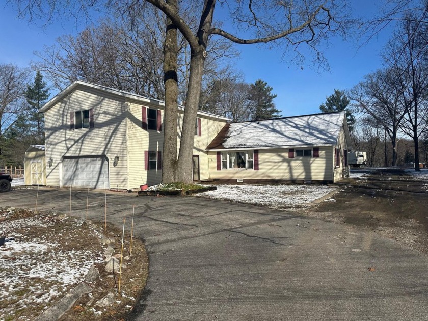 Spacious 5 bedroom 2.5 bath home on Bear Creek.  This home is an - Beach Home for sale in Muskegon, Michigan on Beachhouse.com