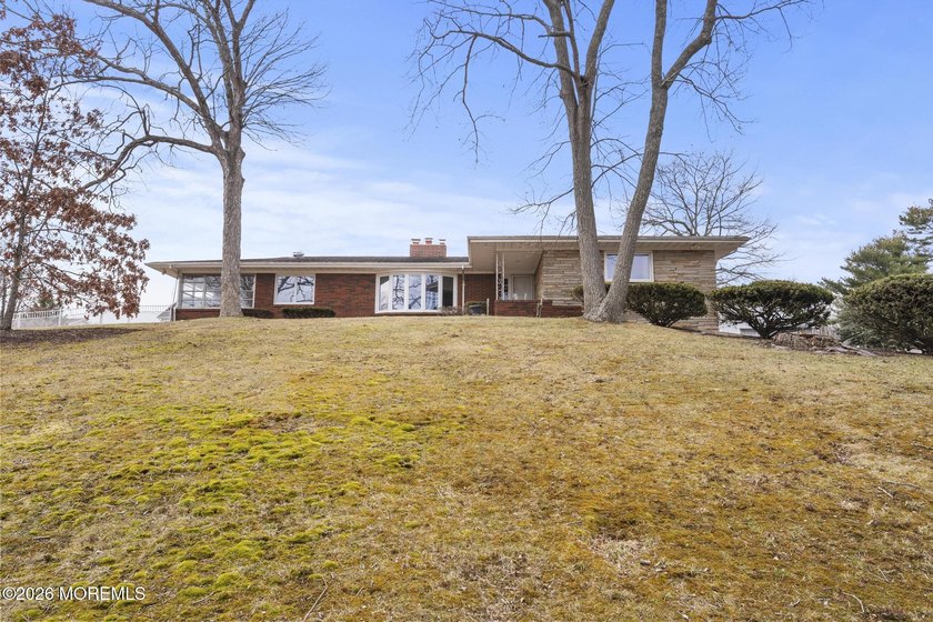 Sprawling custom brick and stone ranch sits on the hill - Beach Home for sale in Toms River, New Jersey on Beachhouse.com