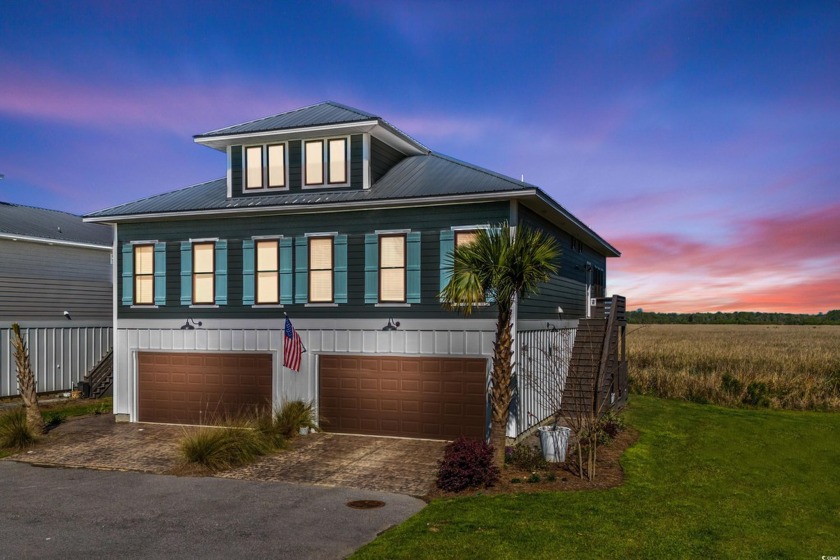 Experience the epitome of luxury living with this impeccably - Beach Townhome/Townhouse for sale in Pawleys Island, South Carolina on Beachhouse.com