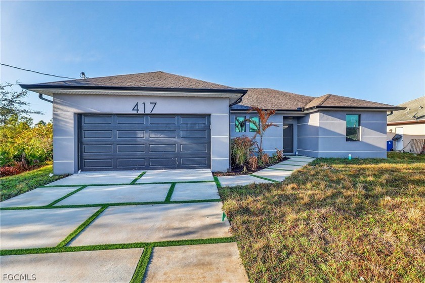 This Brand-New Construction is ONE-OF-A- KIND. With 4-bedroom - Beach Home for sale in Lehigh Acres, Florida on Beachhouse.com