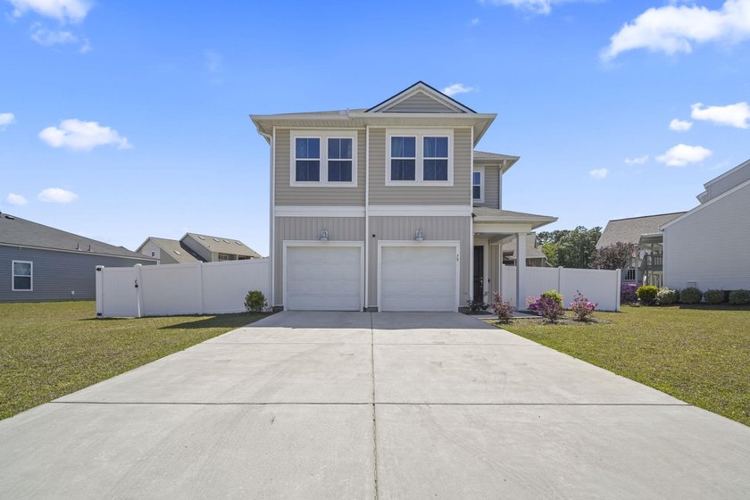Live the coastal lifestyle in this beautiful 3-bedroom, 2.5-bath - Beach Home for sale in Surfside Beach, South Carolina on Beachhouse.com