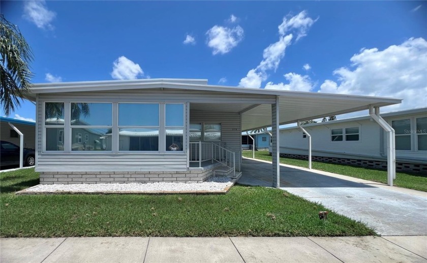 This beautifully maintained 2-bedroom, 2-bath home is truly - Beach Home for sale in Largo, Florida on Beachhouse.com
