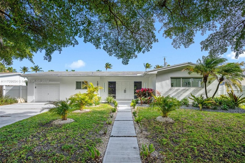 Located on a quiet street in the highly desirable Sky Lake - Beach Home for sale in North Miami Beach, Florida on Beachhouse.com