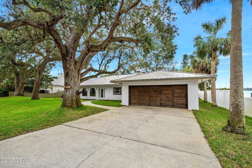 Lovely direct riverfront pool home on a sprawling, oak covered - Beach Home for sale in Ormond Beach, Florida on Beachhouse.com