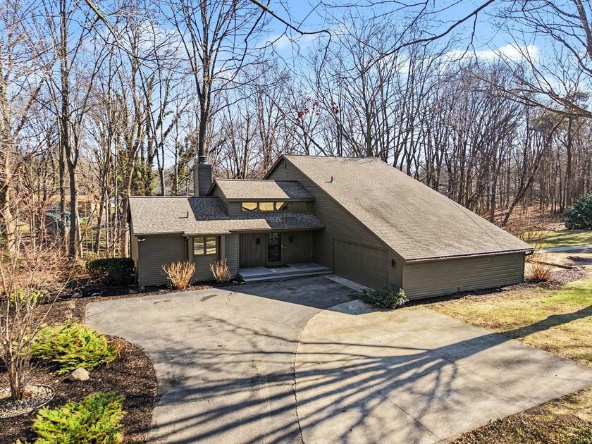 Discover a rare opportunity to own a private retreat in an - Beach Home for sale in Holland, Michigan on Beachhouse.com