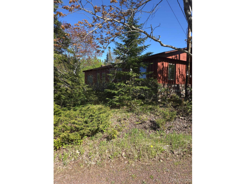 Escape to your own private retreat on the shores of Lake - Beach Home for sale in Eagle Harbor, Michigan on Beachhouse.com