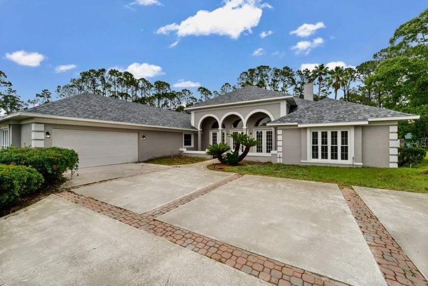 This stunning, newly renovated property is located on two lots - Beach Home for sale in Palm Coast, Florida on Beachhouse.com