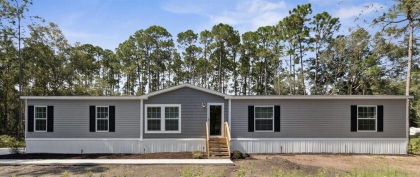 Save time and money on buying a lot and developing your own - Beach Home for sale in Fernandina Beach, Florida on Beachhouse.com