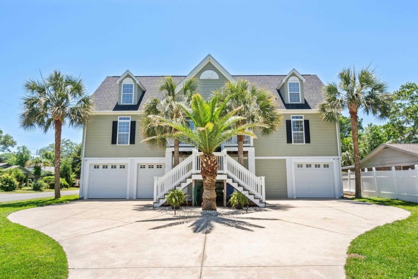 Welcome to your private coastal oasis--no HOA and east of Hwy - Beach Home for sale in Surfside Beach, South Carolina on Beachhouse.com