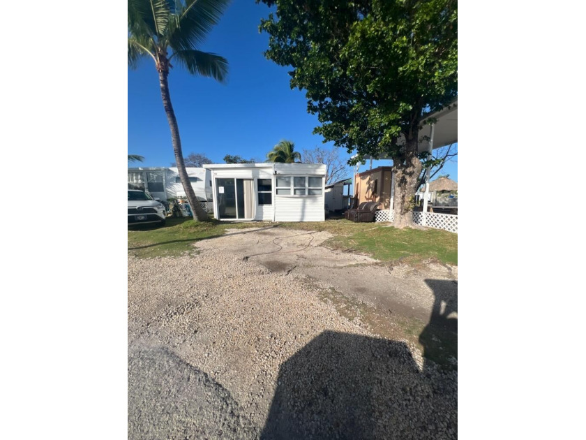 1991 Unit located directly on Florida Bay with a connected deck - Beach Home for sale in Key Largo, Florida on Beachhouse.com