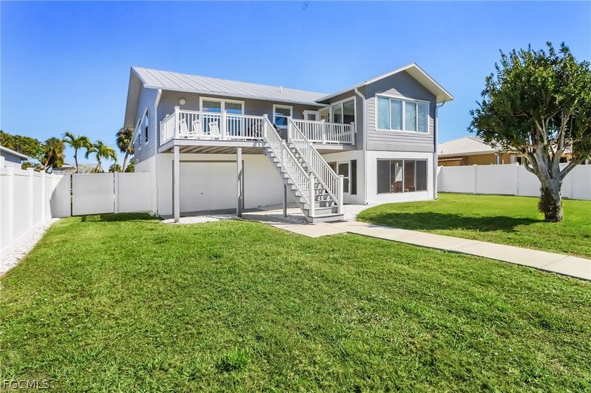 Experience the best of Southwest Florida waterfront living in - Beach Home for sale in Bokeelia, Florida on Beachhouse.com