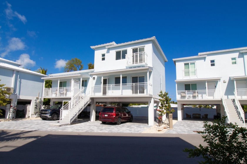 Brand New Oceanfront Complex never lived in. Concrete - Beach Home for sale in Marathon, Florida on Beachhouse.com