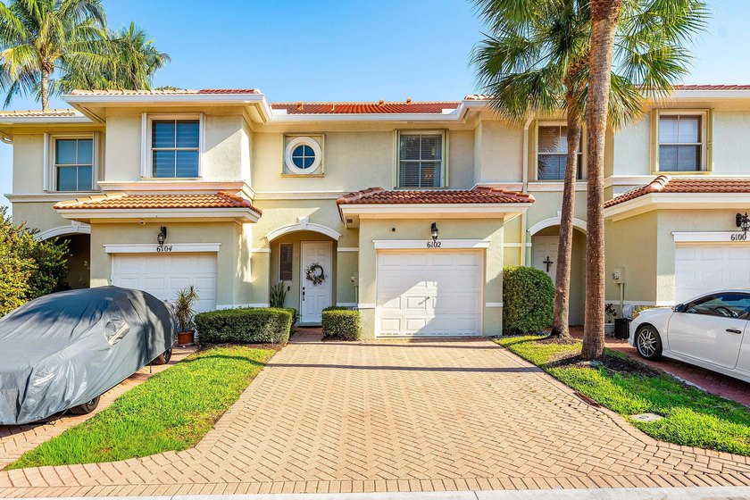 Situated within the gated, family friendly community of Woodbine - Beach Townhome/Townhouse for sale in Riviera Beach, Florida on Beachhouse.com
