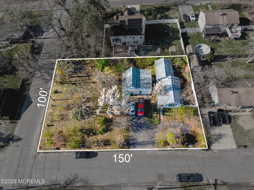 BUILD NEW or renovate on this 150 x 100 corner lot in blooming - Beach Home for sale in Toms River, New Jersey on Beachhouse.com