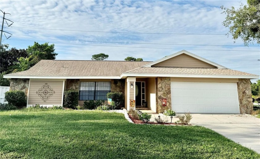 Beautiful updates for this home include the kitchen cabinets - Beach Home for sale in Holiday, Florida on Beachhouse.com