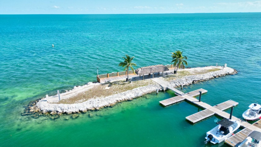 Great Location by PRIVATE BEACH with a PEEK-A-BOO BAY VIEW- - Beach Home for sale in Long Key, Florida on Beachhouse.com