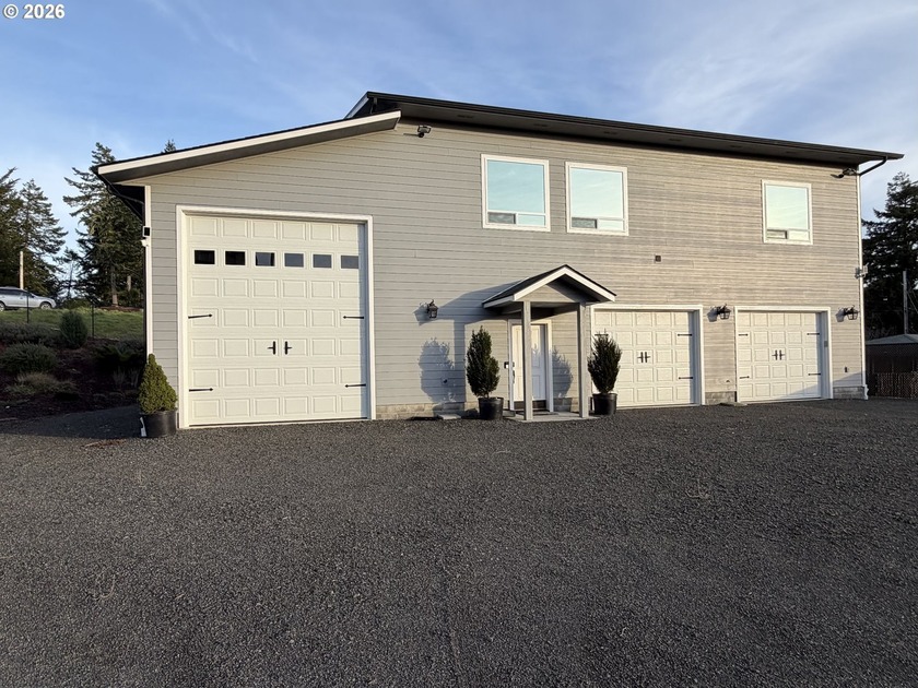 Built in 2018, this rare Home / Shop / RV Garage all-in-one - Beach Home for sale in Coos Bay, Oregon on Beachhouse.com