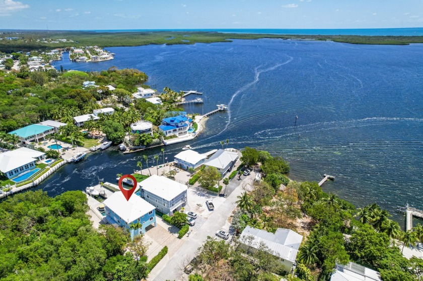 Rarely available with an Iconic address, this luxury waterfront - Beach Home for sale in Key Largo, Florida on Beachhouse.com