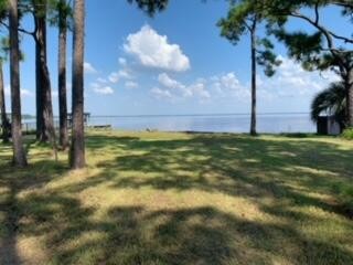 TRANQUIL, SERENE LOT with 101.1 BAY-FRONT FT and GULF ACCESS! - Beach Lot for sale in Panama City Beach, Florida on Beachhouse.com