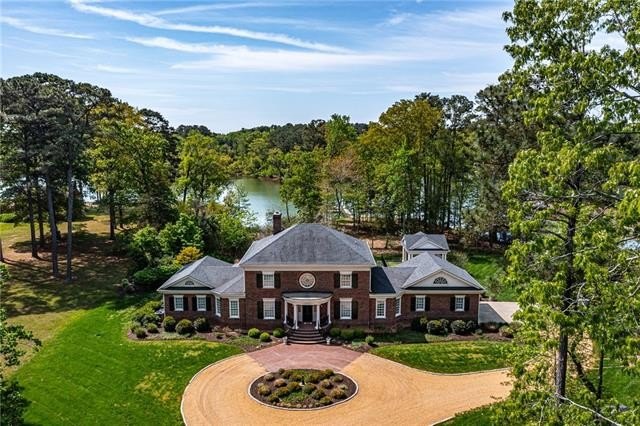 Elegant waterfront manor on Jarvis Creek, nestled just off - Beach Home for sale in Kilmarnock, Virginia on Beachhouse.com