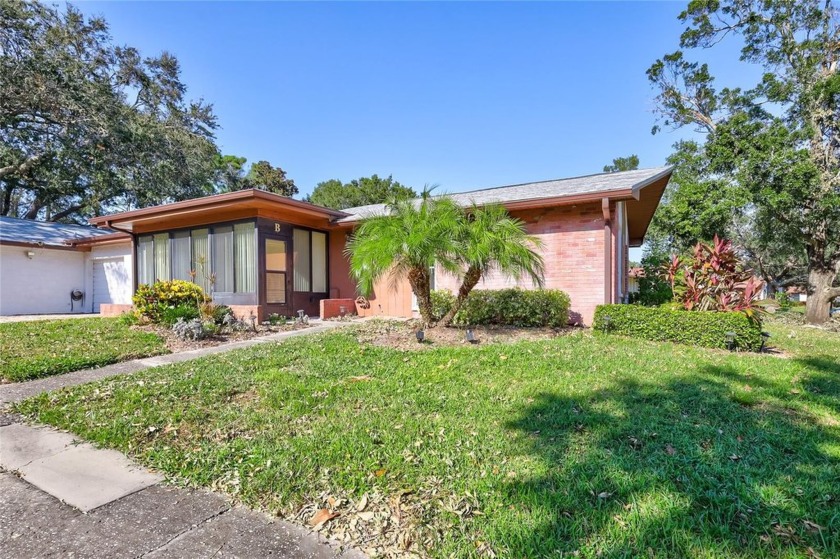 *Move-in ready and vacant, this spacious condo features two - Beach Home for sale in Palm Harbor, Florida on Beachhouse.com