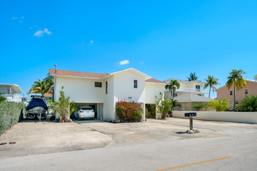 This waterfront multi-family tri-plex is located in the coveted - Beach Home for sale in Key Largo, Florida on Beachhouse.com