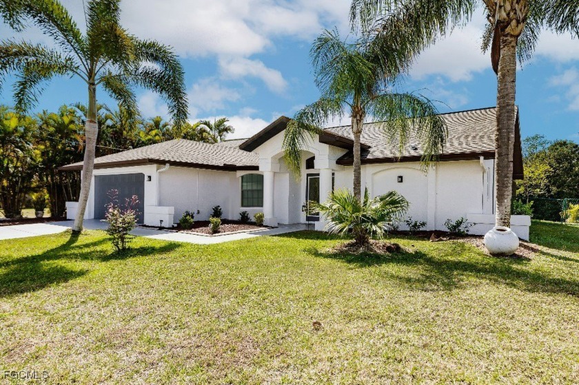 This TURN KEY property is perfectly situated directly on a - Beach Home for sale in Cape Coral, Florida on Beachhouse.com
