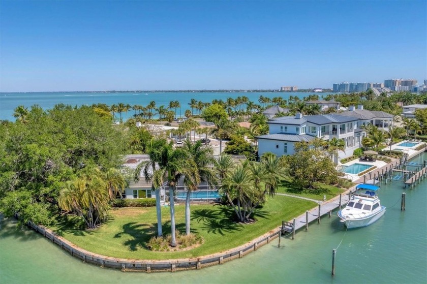 Nestled on a half-acre corner lot, this waterfront property - Beach Home for sale in Sarasota, Florida on Beachhouse.com