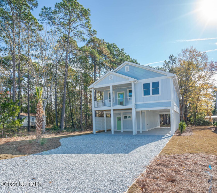 Stunning NEW HOME with luxe finishes .  This beautifully - Beach Home for sale in Sunset Beach, North Carolina on Beachhouse.com