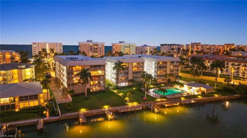 Welcome to your waterfront retreat in the prestigious Moorings - Beach Condo for sale in Naples, Florida on Beachhouse.com