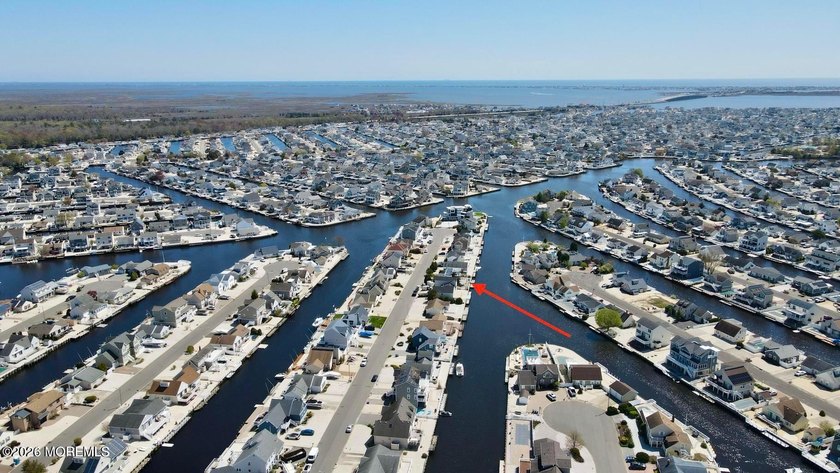 Waterfront living at its finest in the sought-after Coves - Beach Home for sale in Manahawkin, New Jersey on Beachhouse.com
