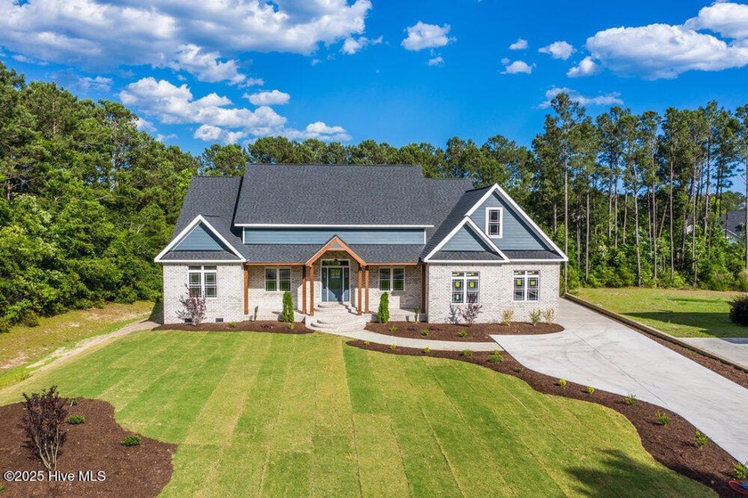 Prepare to be captivated by this stunning new construction - Beach Home for sale in Hampstead, North Carolina on Beachhouse.com