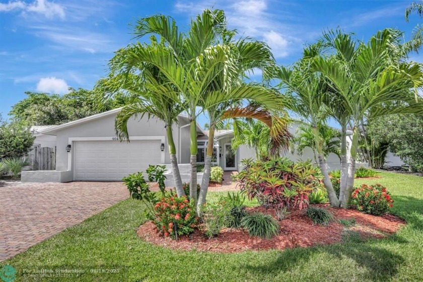 Discover your slice of paradise in this rare no-HOA waterfront - Beach Home for sale in Pompano Beach, Florida on Beachhouse.com
