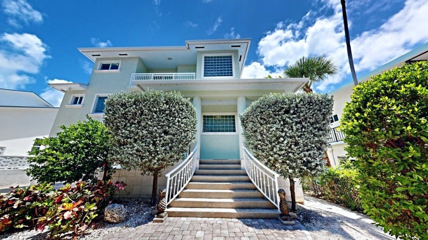 Indulge in waterfront luxury in the heart of Key Largo! This - Beach Home for sale in Key Largo, Florida on Beachhouse.com