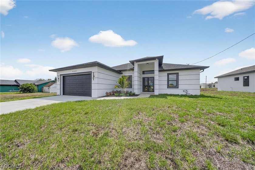 Beautiful new construction home featuring 3 bedrooms plus a den - Beach Home for sale in Lehigh Acres, Florida on Beachhouse.com