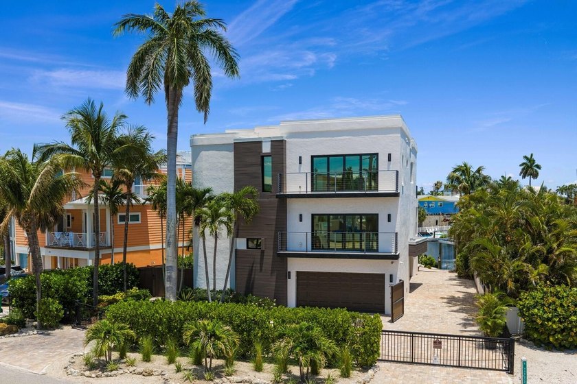 Located in the heart of Holmes Beach on Anna Maria Island, this - Beach Home for sale in Holmes Beach, Florida on Beachhouse.com