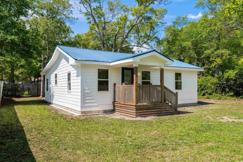 Located just four blocks from the pristine sands of Surfside - Beach Home for sale in Surfside Beach, South Carolina on Beachhouse.com
