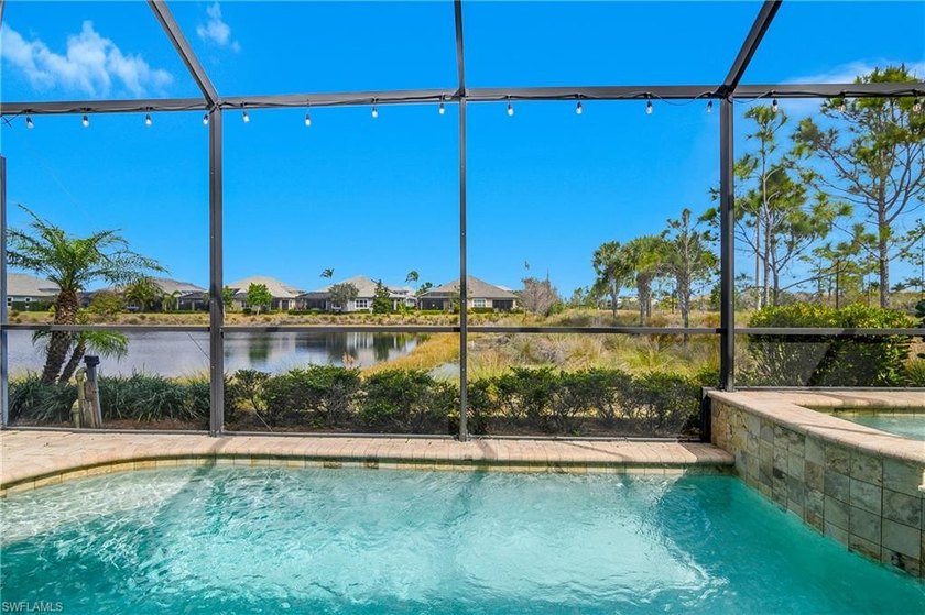 Pool and Spa overlooking beautiful water views with the added - Beach Townhome/Townhouse for sale in Naples, Florida on Beachhouse.com