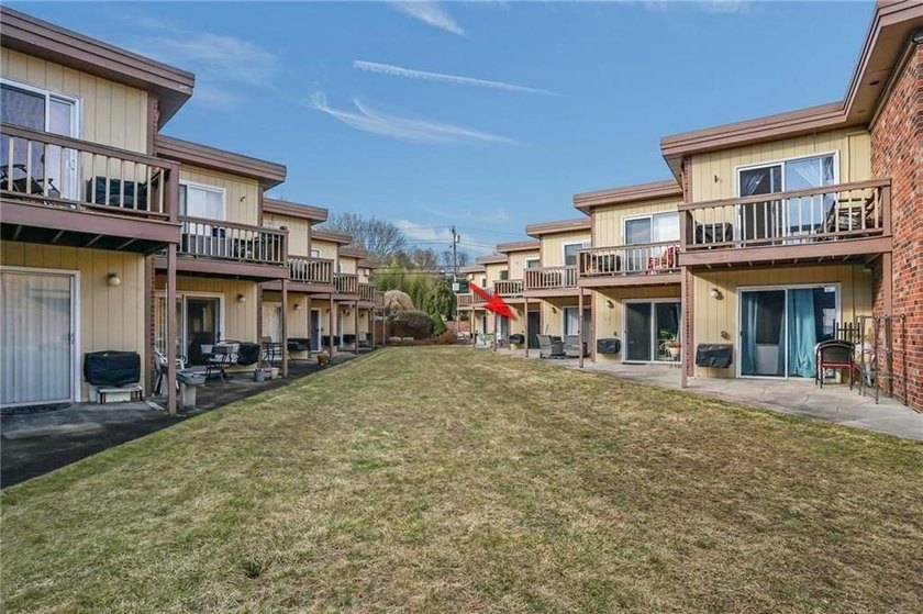 Enjoy single-level living with stunning water views of Greenwich - Beach Condo for sale in Warwick, Rhode Island on Beachhouse.com