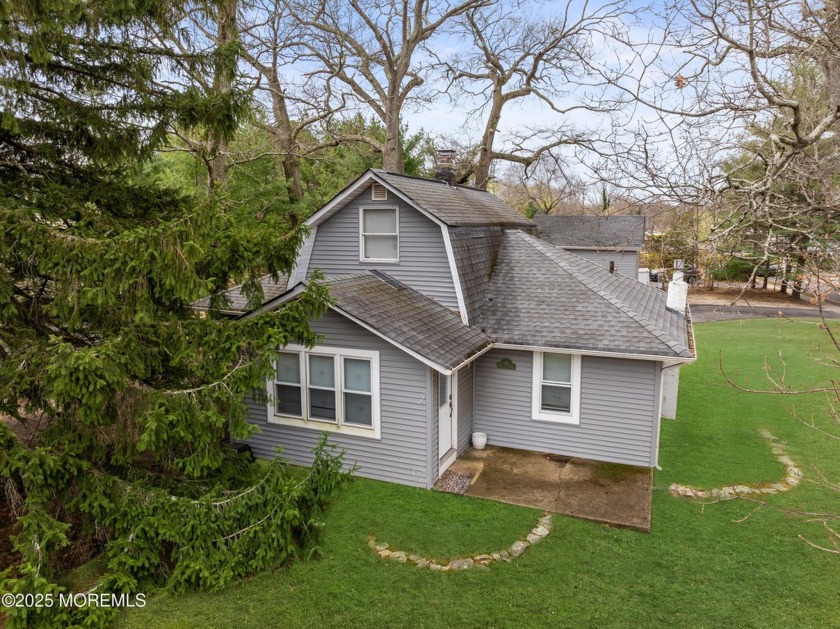 Come and see this colonial with 3 bedrooms and 2 full bath on a - Beach Home for sale in Oakhurst, New Jersey on Beachhouse.com