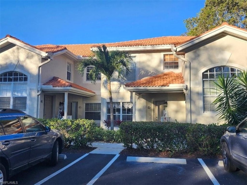 Beautiful first floor end unit with a gorgeous view of the lake - Beach Home for sale in Naples, Florida on Beachhouse.com