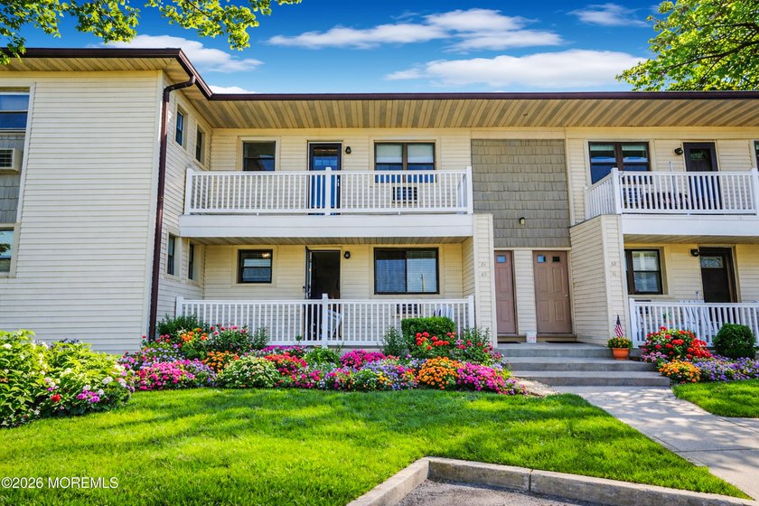 Welcome to 63 Wharfside Drive, where waterfront living meets - Beach Condo for sale in Monmouth Beach, New Jersey on Beachhouse.com