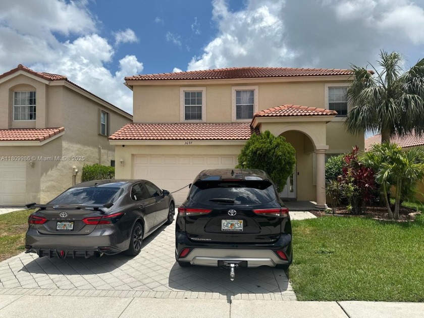 Beautiful lakefront single-family home in the sought-after Grand - Beach Home for sale in Wellington, Florida on Beachhouse.com