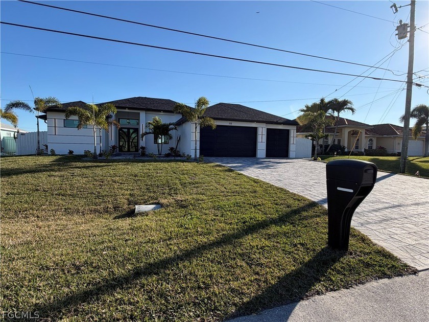 This new construction home features 4 spacious bedrooms and 3 - Beach Home for sale in Cape Coral, Florida on Beachhouse.com