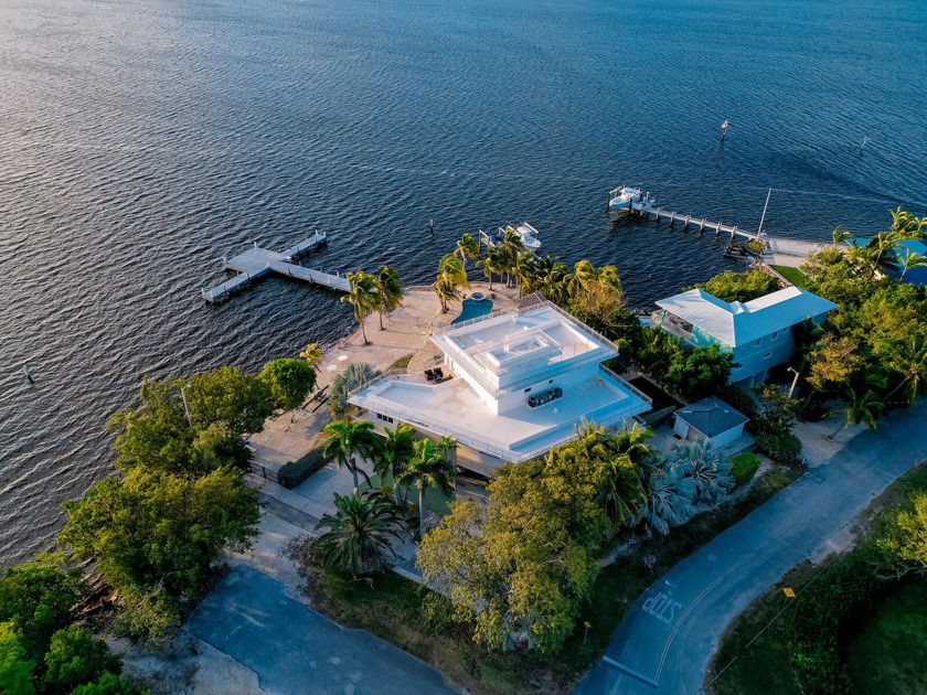 Discover the epitome of luxury living in Key Largo! This - Beach Home for sale in Key Largo, Florida on Beachhouse.com