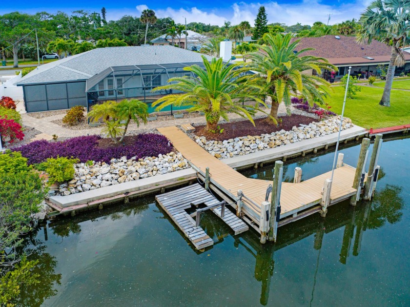 Canalfront, boat dock, inground pool and spa, xeriscaped yard - Beach Home for sale in Cocoa Beach, Florida on Beachhouse.com